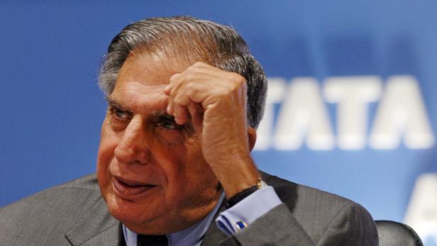 epa03287696 Ratan Tata, Chairman, Tata Group attends the 17th annual general meeting of Tata Consultancy Services (TCS) in Mumbai, India, 29 July, 2012. Reports state that TCS is Indiaís largest IT Service firm, crosses 10 billion US dollars on strong growth momentum in 2011-12, the annual revenues up by 24 per cent at 10.17 billion US dollars and the annual net income at 2.2 billion US dollars, up by 16 per cent Year on Year. EPA/DIVYAKANT SOLANKI