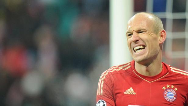 epa03622505 Munich&#039;s Arjen Robben reacts during the UEFA Champions League soccer round of sixteen between FC Bayern Munich and Arsenal FC in Munich, Germany, 13 March 2013. EPA/MARC MUELLER