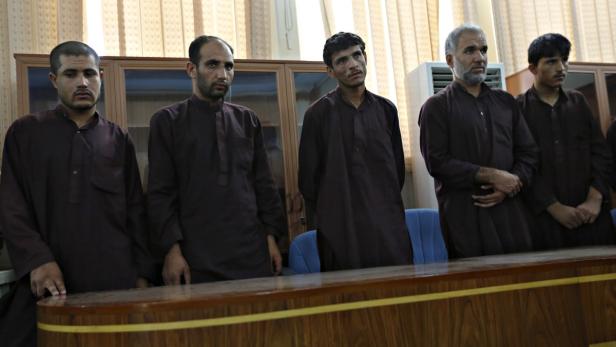 Five of seven men convicted of raping and robbing