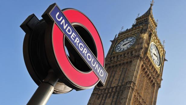 The Westminster Station London Underground sign is seen near The Houses of Parliament , in central London March 8, 2011. REUTERS/Toby Melville (BRITAIN - Tags: CITYSCAPE SOCIETY TRAVEL)