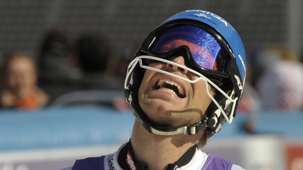 Austria&#039;s Benjamin Raich reacts after the men&#039;s slalom World Cup race in Kranjska Gora March 11, 2012. REUTERS/Srdjan Zivulovic (SLOVENIA - Tags: SPORT SKIING)