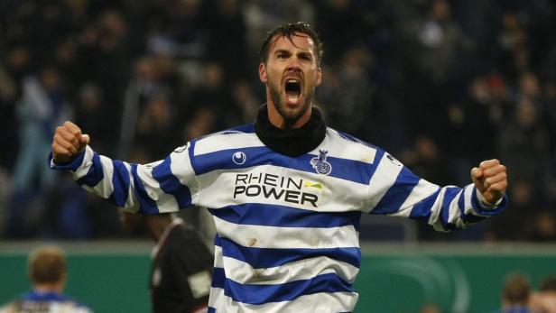 Duisburg&#039;s Stefan Maierhofer celebrates a goal against Kaiserslautern during the German soccer cup (DFB-Pokal) quarter-final match in Duisburg, January 26, 2011. REUTERS/Ina Fassbender (GERMANY - Tags: SPORT SOCCER) DFB RULES PROHIBIT USE IN MMS SERVICES VIA HANDHELD DEVICES UNTIL TWO HOURS AFTER A MATCH AND ANY USAGE ON INTERNET OR ONLINE MEDIA SIMULATING VIDEO FOOTAGE DURING THE MATCH