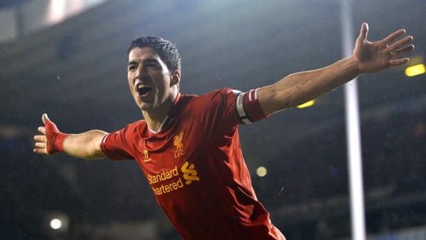 Liverpool's Suarez celebrates after scoring a goal