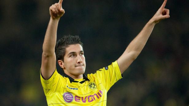 epa03531164 (FILE) A file picture dated 21 October 2010 shows Dortmund&#039;s Nuri Sahin celebrating after scoring the opening goal during the UEFA Europa League soccer match between Borussia Dortmund and Paris St. Germain in Dortmund, Germany. Turkish forward Nuri Sahin is set to return to German Bundesliga side Borussia Dortmund, ending his loan spell at Liverpool, German media reports stated on 11 January 2013. EPA/BERNDÂ THISSEN