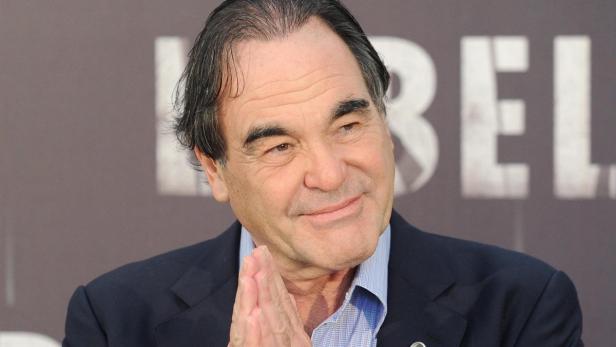 EPAepa03409818 US filmmaker Oliver Stone poses during the presentation of his movie Savages in Rome, Italy, 25 September 2012. The movie will be released in Italian theatres on 25 October 2012. EPA/ETTORE FERRARI