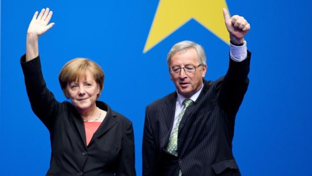 An Angela Merkel hängt die Bestellung des nächsten Kommissionschefs – die deutsche Kanzlerin will sich (noch) nicht auf Juncker festlegen lassen.