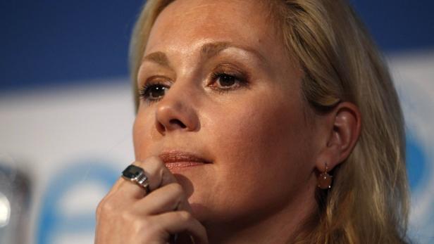 Bettina Wulff, wife of German President Christian Wulff and UNICEF patroness attends a news conference to present the UNICEF photo of the year in Berlin, December 20, 2011. REUTERS/Fabrizio Bensch (GERMANY - Tags: POLITICS SOCIETY)