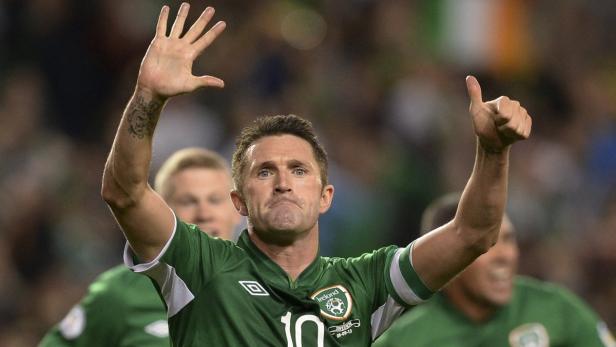 Robbie Keane jubelt in seinem grünen Trikot mit der Nummer 10 für Irland.