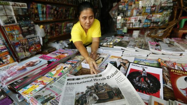 Die letzte Ausgabe der International Herald Tribune in Bangkok