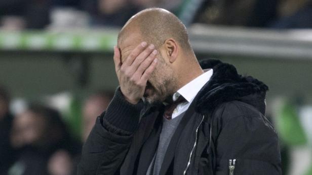 Bayern Munich coach Guardiola reacts during Bundes