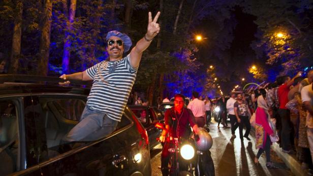 Iranians celebrate in the streets following a nucl