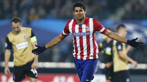 Atletico Madrid's Costa celebrates scoring goal ag