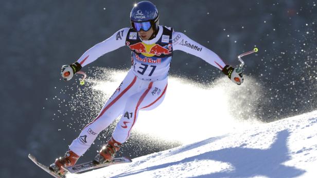 APA11121780 - 23012013 - KITZBÜHEL - ÖSTERREICH: Benjamin Raich (AUT) am Mittwoch, 23. Jänner 2013, in Aktion während des zweiten Abfahrtstrainings der Herren auf der Streif in Kitzbühel. APA-FOTO: HANS KLAUS TECHT