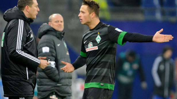 epa03558670 Bremen&#039;s Marko Arnautovic talks to the fourth official on the sidelines during the German Bundesliga match between Hamburger SV and Werder Bremen at Imtech Arena in Hamburg, Germany, 27 January 2013. (ATTENTION: EMBARGO CONDITIONS! The DFL permits the further utilisation of up to 15 pictures only (no sequntial pictures or video-similar series of pictures allowed) via the internet and online media during the match (including halftime), taken from inside the stadium and/or prior to the start of the match. The DFL permits the unrestricted transmission of digitised recordings during the match exclusively for internal editorial processing only (e.g. via picture picture databases) EPA/AXEL HEIMKEN