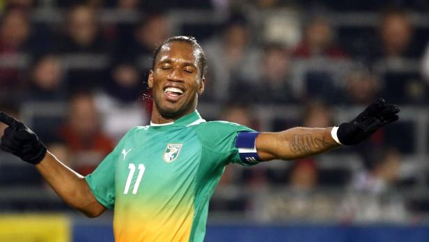 Ivory Coast&#039;s Didier Drogba reacts after scoring a goal during the international friendly soccer match against Austria in Linz November 14, 2012. REUTERS/ Dominic Ebenbichler (AUSTRIA - Tags: SPORT SOCCER)