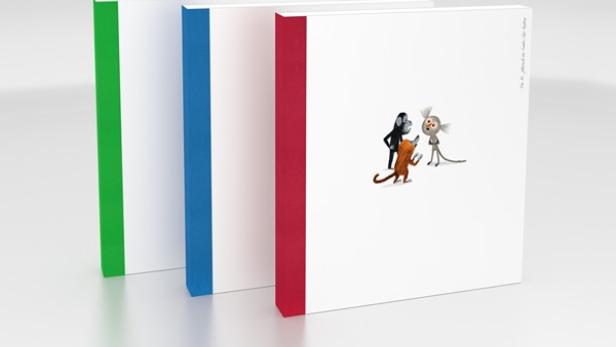 Drei Bücher stehen nebeneinander, das Cover des Buches zeigt drei Cartoon-Figuren.