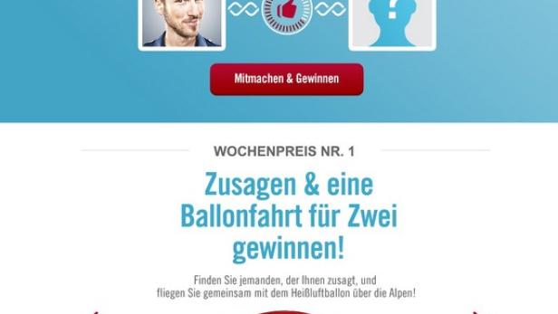 Ein Werbebildschirm für ein Gewinnspiel mit der Chance auf eine Ballonfahrt für zwei Personen.