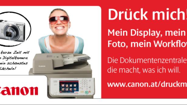 Eine lächelnde Frau mit Sonnenbrille vor einem Canon Drucker und einer Canon Digitalkamera.