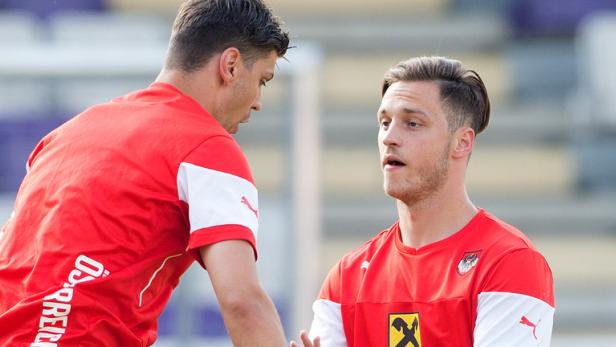 Gemeinsam stark: Österreichs Kicker (im Bild Dragovic und Arnautovic) setzen auf das Kollektiv.