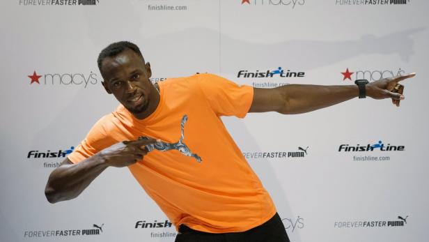 Bolt poses during a visit at Macy's Herald Square