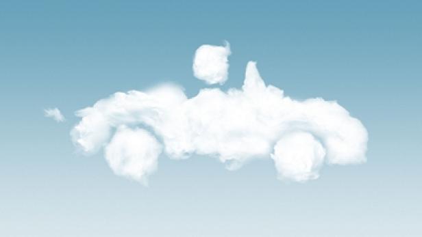 Ein Auto, geformt aus Wolken, fährt durch den Himmel.