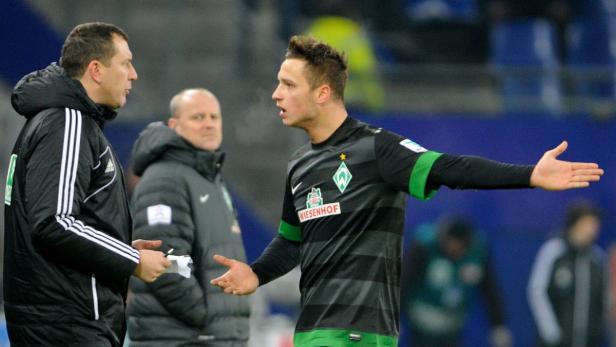 epa03558670 Bremen&#039;s Marko Arnautovic talks to the fourth official on the sidelines during the German Bundesliga match between Hamburger SV and Werder Bremen at Imtech Arena in Hamburg, Germany, 27 January 2013. (ATTENTION: EMBARGO CONDITIONS! The DFL permits the further utilisation of up to 15 pictures only (no sequntial pictures or video-similar series of pictures allowed) via the internet and online media during the match (including halftime), taken from inside the stadium and/or prior to the start of the match. The DFL permits the unrestricted transmission of digitised recordings during the match exclusively for internal editorial processing only (e.g. via picture picture databases) EPA/AXEL HEIMKEN