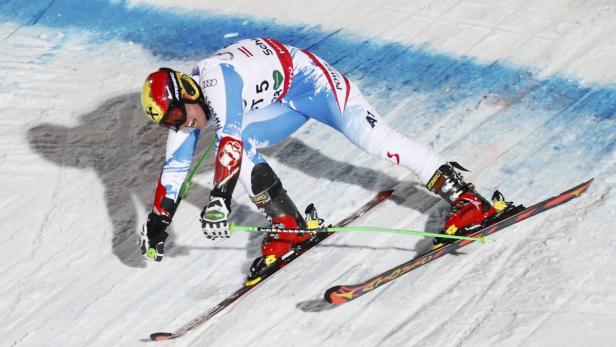 Marcel Hirscher of Austria competes during the national team event at the World Alpine Skiing Championships in Schladming February 12, 2013. REUTERS/Leonhard Foeger (AUSTRIA - Tags: SPORT SKIING)