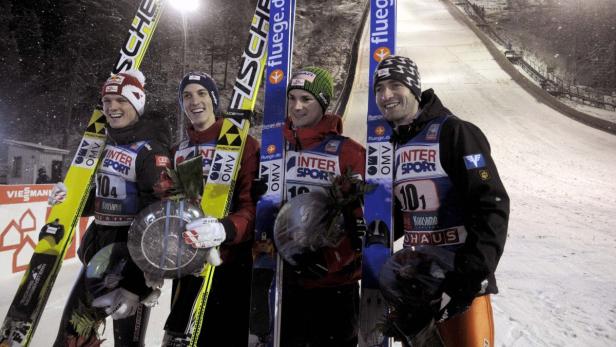 (L-R) Austria&#039;s Thomas Morgenstern, Gregor Schlierenzauer, Manuel Fettner and Wolfgang Loittzl pose for a picture after finishing second in the Ski Jumping HS 142 Team Competition of the FIS World Cup Ruka Nordic Opening 2012 in Kuusamo, Finland, November 30, 2012. REUTERS/Markku Ulander/Lehtikuva (FINLAND - Tags: SPORT SKIING) THIS IMAGE HAS BEEN SUPPLIED BY A THIRD PARTY. IT IS DISTRIBUTED, EXACTLY AS RECEIVED BY REUTERS, AS A SERVICE TO CLIENTS. NO THIRD PARTY SALES. NOT FOR USE BY REUTERS THIRD PARTY DISTRIBUTORS. FINLAND OUT. NO COMMERCIAL OR EDITORIAL SALES IN FINLAND