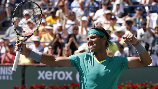 Rafael Nadal of Spain celebrates defeating Tomas Berdych of the Czech Republic in their men&#039;s singles semifinal match at the BNP Paribas Open ATP tennis tournament in Indian Wells, California, March 16, 2013. REUTERS/Danny Moloshok (UNITED STATES - Tags: SPORT TENNIS)