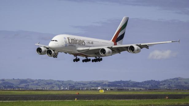 A handout photo taken on March 2, 2016 and received on March 3, shows an Emirates Airbus A380 touching down in Auckland, completing what is believed to be the world&#039;s longest non-stop scheduled commercial flight. The service from Dubai to Auckland covered 14,200 kilometres (8,824 miles), according to industry website airwaysnews.com, pipping Qantas&#039; 13,800-kilometre Sydney-Dallas route launched in 2014. AFP PHOTO / EMIRATES / OLLIE DALE ----EDITORS NOTE ----RESTRICTED TO EDITORIAL USE MANDATORY CREDIT &quot; AFP PHOTO / EMIRATES / OLLIE DALE&quot; NO MARKETING NO ADVERTISING CAMPAIGNS - DISTRIBUTED AS A SERVICE TO CLIENTS
