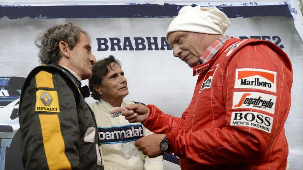 Zehn WM-Titel auf einem Bild: Der Österreicher Niki Lauda (dreifacher Weltmeister) plaudert mit dem Franzosen Alain Prost (4, links) und dem Brasilianer Nelson Piquet (3).