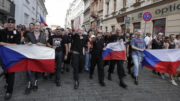 Far-right Czech activists shout as they march in protest against the Roma minority in Plzen August 24, 2013. Far-right groups held several anti-Roma demonstrations across the country on Saturday. REUTERS/David W Cerny (CZECH REPUBLIC - Tags: POLITICS CIVIL UNREST)