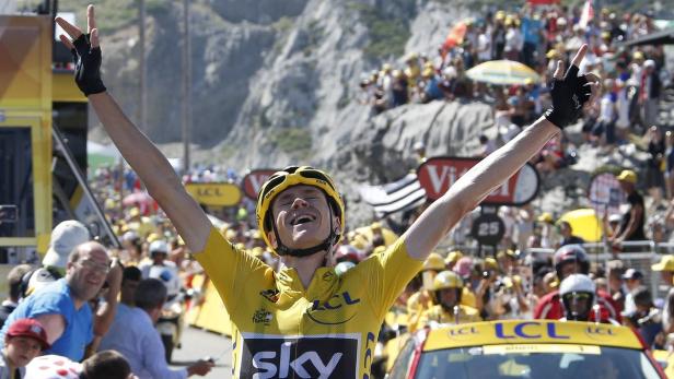 Team Sky rider Froome of Britain, race leader's ye