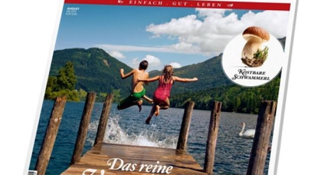Das Cover des „Servus in Stadt & Land“-Magazins zeigt Kinder, die von einem Steg in einen See springen.
