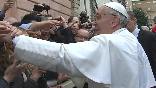 Newly elected Pope Francis greets crowds before hi