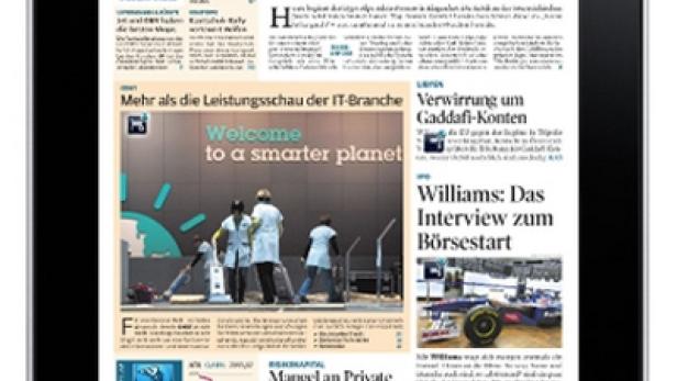 Ein iPad zeigt die Titelseite des „WirtschaftsBlatt“.
