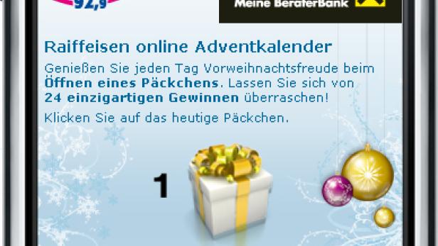 Auf dem Bildschirm eines iPhones wird der Online-Adventskalender von Raiffeisen beworben.