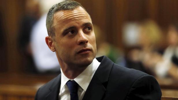 Olympic and Paralympic track star Oscar Pistorius sits in the dock in the North Gauteng High Court in Pretoria in this May 6, 2014 file photo. South Africa&#039;s top appeals court ruled on December 3, 2015 that Pistorius&#039; conviction be scaled up to murder from culpable homicide for killing his girlfriend Reeva Steenkamp on Valentine&#039;s Day 2013. REUTERS/Mike Hutchings/Files TPX IMAGES OF THE DAY