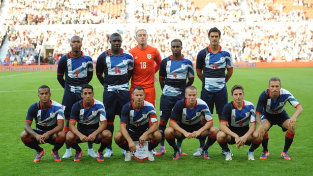 Das Team GB posiert für ein Foto bei den Olympischen Spielen 2012 in London.