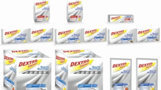 Verschiedene Produkte von Dextro Energy, darunter Gels, Riegel und Getränkepulver.