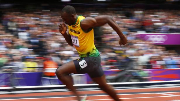 Usain Bolt rennt bei einem Leichtathletikwettkampf.