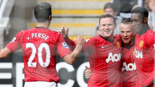 Mehrere Manchester United-Spieler feiern gemeinsam ein Tor.