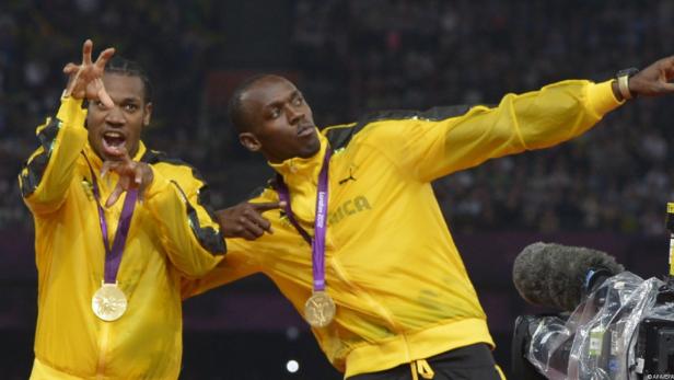 Usain Bolt und Yohan Blake feiern ihren Sieg bei den Olympischen Spielen.