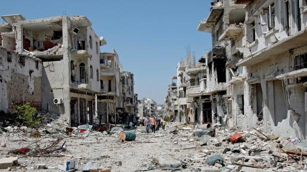 Homs nach zwei Jahren schwerer Kämpfe: Die großflächig zerbombte Ex-Rebellenhochburg mit einst 800.000 Einwohnern ist wieder weitgehend unter Assads Kontrolle.