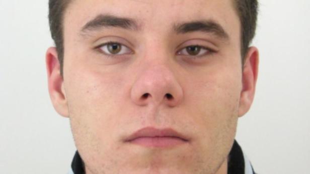 Porträt eines jungen Mannes mit braunen Augen.