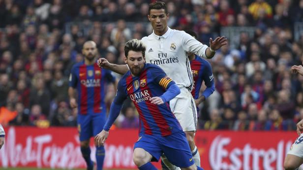 Messi und Ronaldo im Zweikampf - so wird es auch heute Abend in Madrid sein.