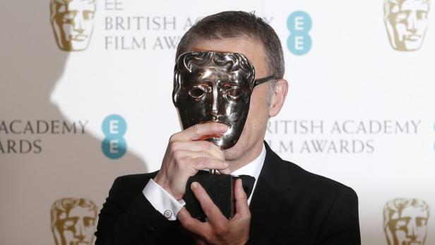 Christoph Waltz celebrates after winning the Best Supporting Actor award for &quot;Django Unchained&quot; at the British Academy of Film and Arts (BAFTA) awards ceremony at the Royal Opera House in London February 10, 2013. REUTERS/Suzanne Plunkett (BRITAIN - Tags: ENTERTAINMENT) (BAFTA-WINNERS)