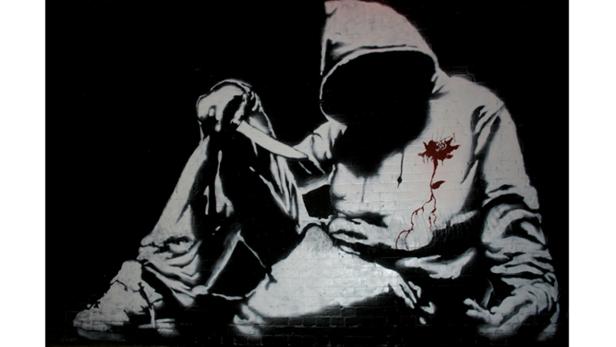 Ein Banksy-Kunstwerk im typischen Schablonen-Stil.