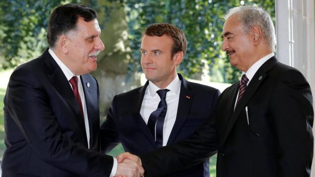 Macron traf sich in Paris mit Sarraj (l.) und Haftar (r.) zu Gesprächen.