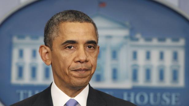 Ein Porträt von Barack Obama vor einem Hintergrund des Weißen Hauses.